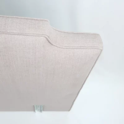 Retaper une tete de lit par un tapissier pour eviter de jeter